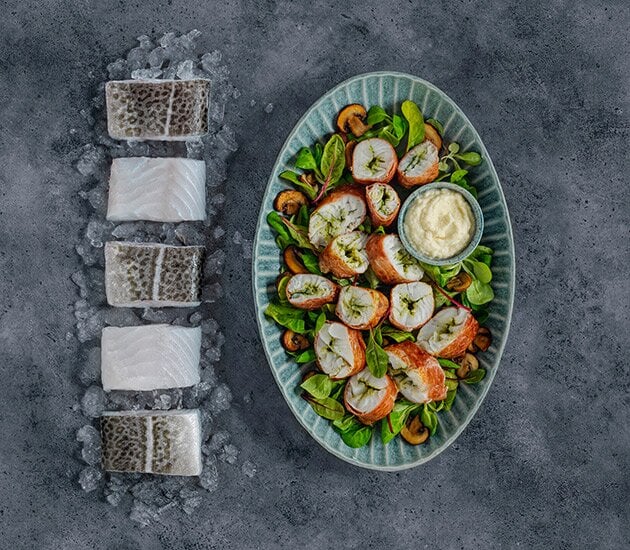 Skrei inlindad i skinka med jordärtskockspuré