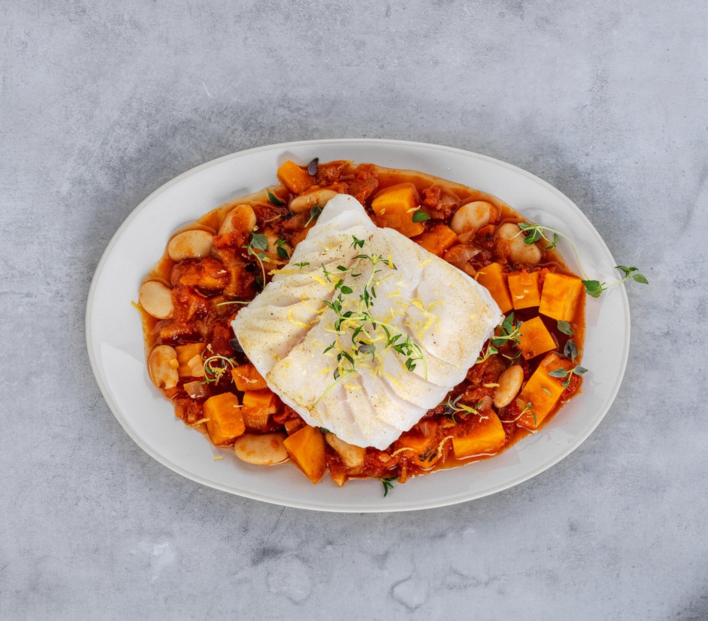 Skrei sauterad med bönor, sötpotatis och timjan 