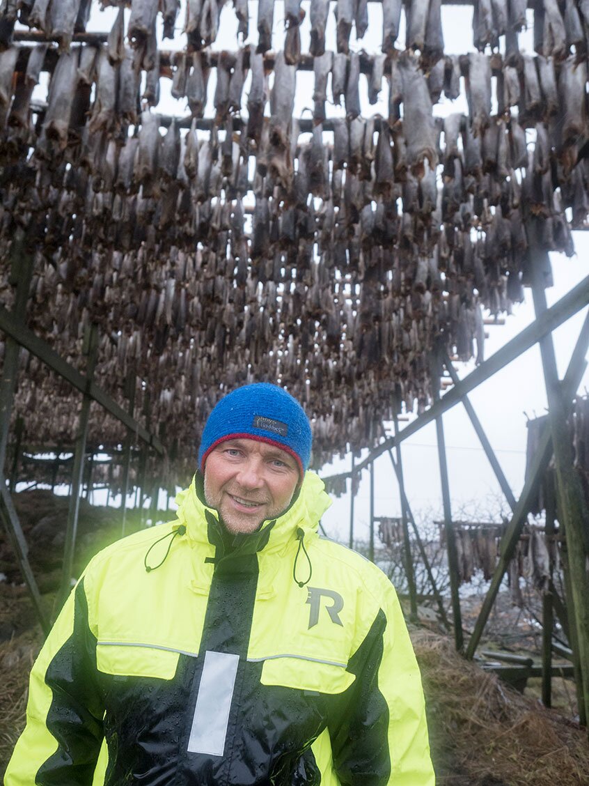 Pal Arild under stockfish drying rack